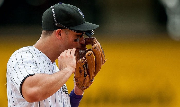 why do baseball players spit so much