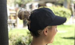 Wearing-the-hat-with-a-bun-of-a-Baseball-Cap